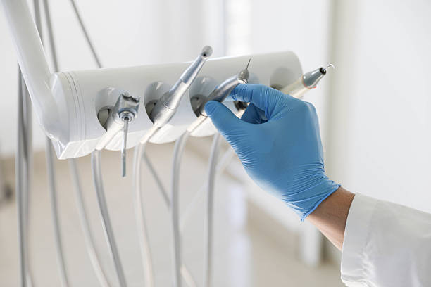 Professional Invisalign Clear Aligners technician working in Mason, MI